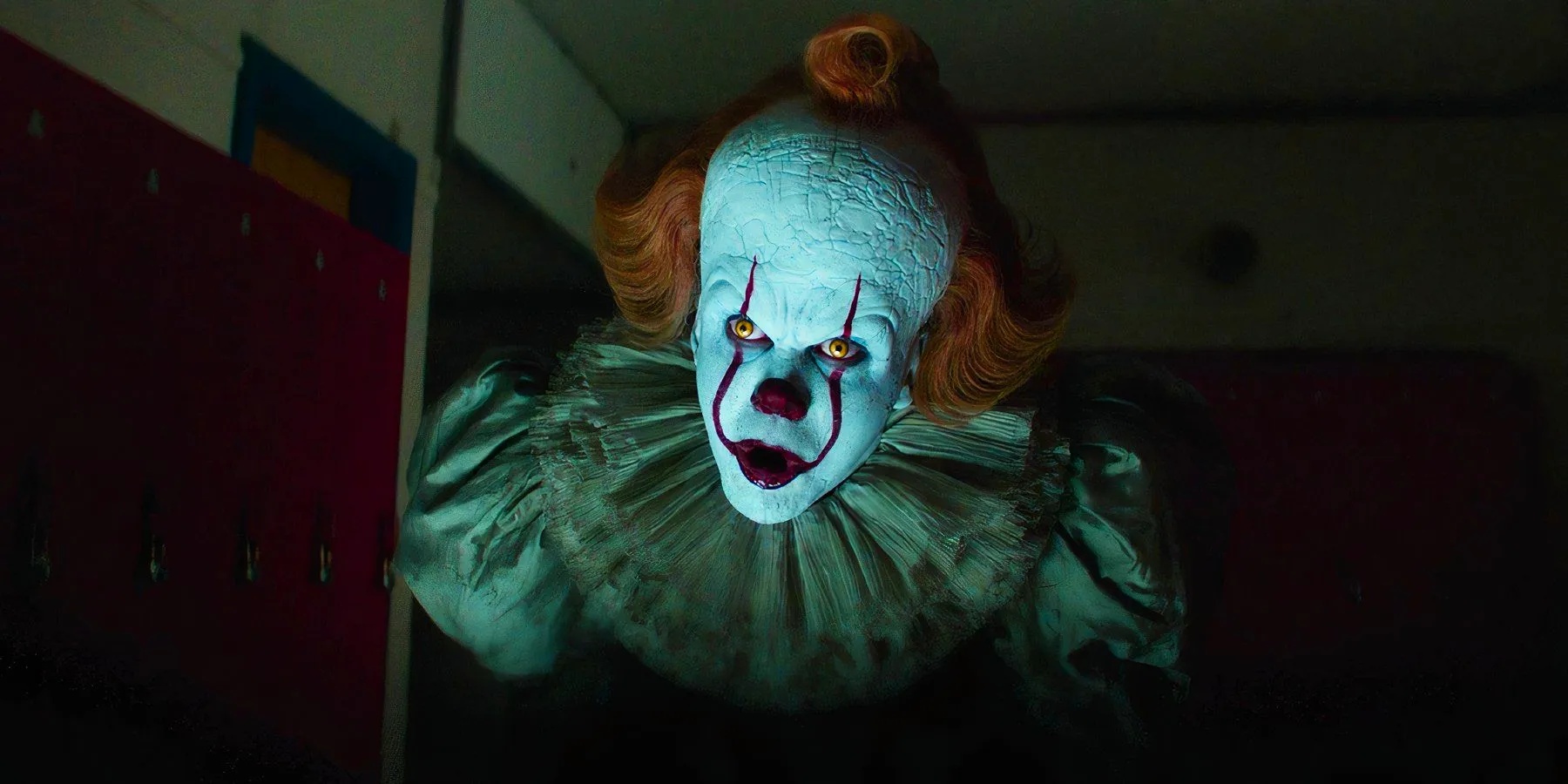 Bill Skarsgård as Pennywise makes a mocking expression in IT Chapter Two Image