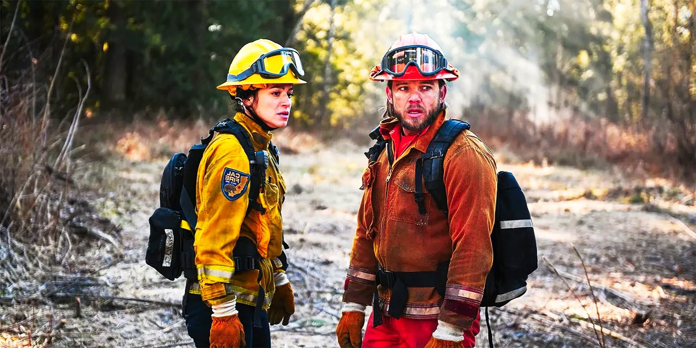 Bode and Gabriela looking shocked in the woods in Fire Country Image