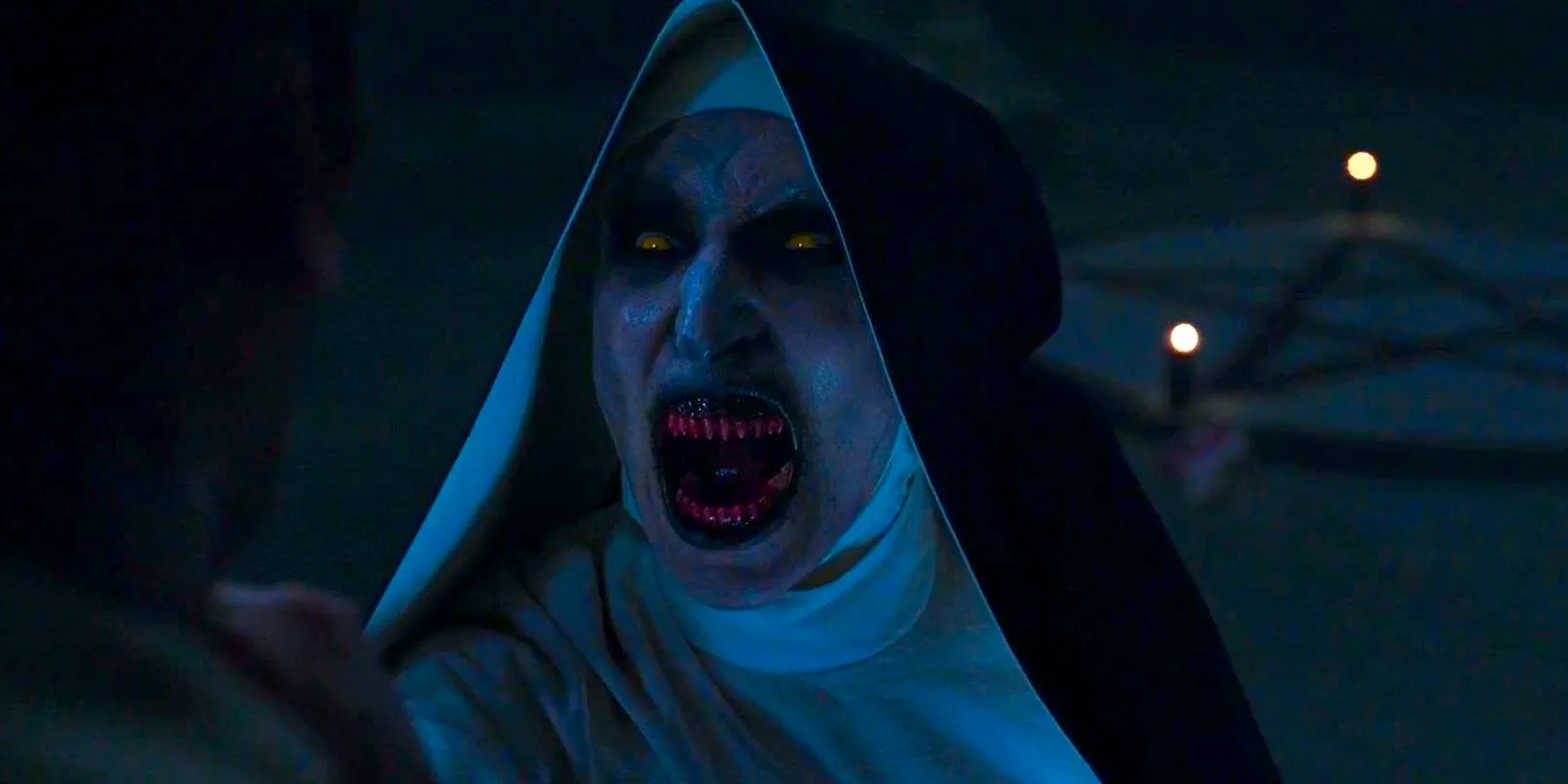 Bonnie Aarons as Valak in The Nun with teeth barred Image