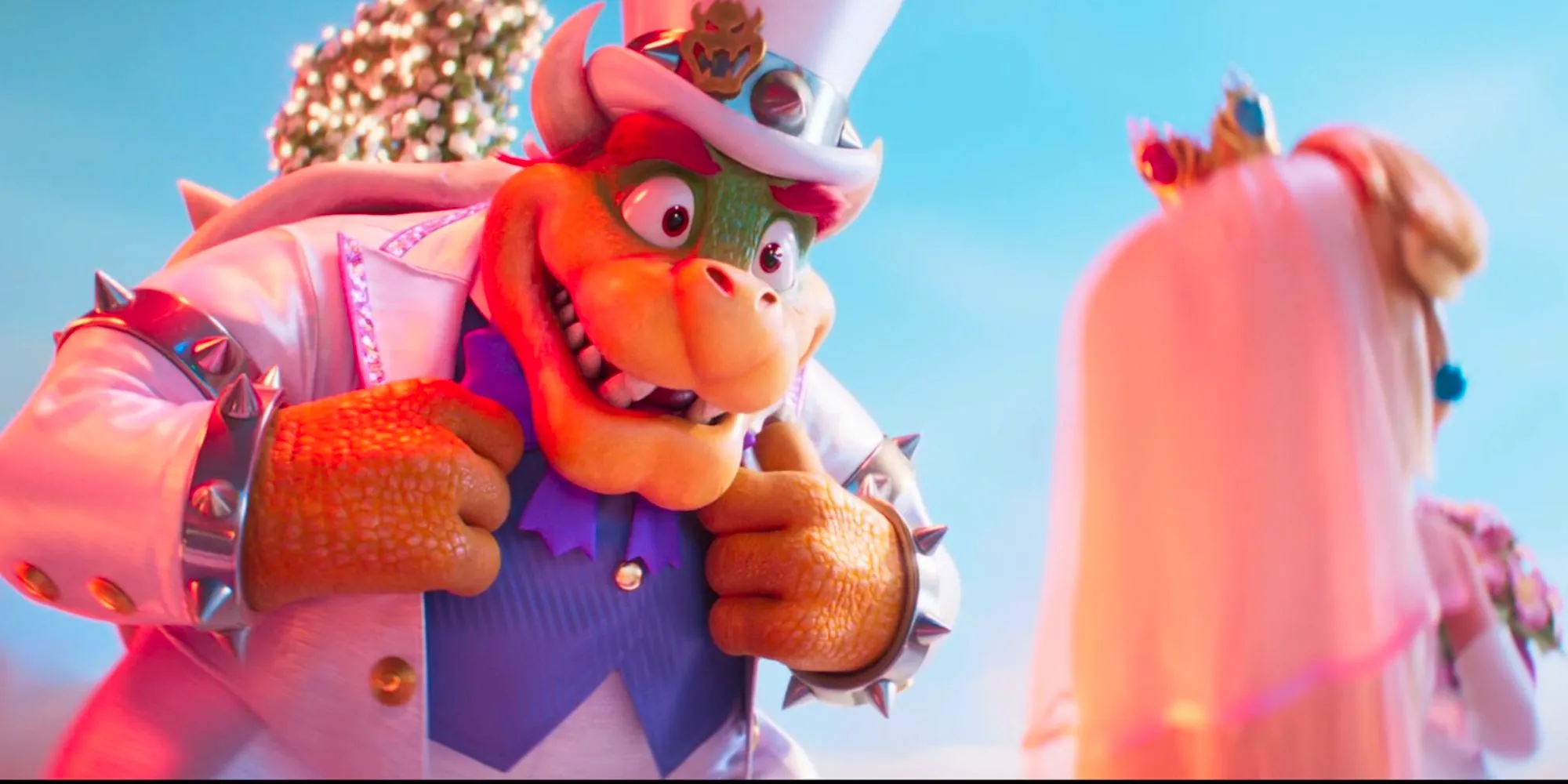 Bowser (Jack Black) looking sharp for his wedding with Peach (Anya Taylor-Joy), whose back is turned against Bowser in The Super Mario Bros. Movie Image