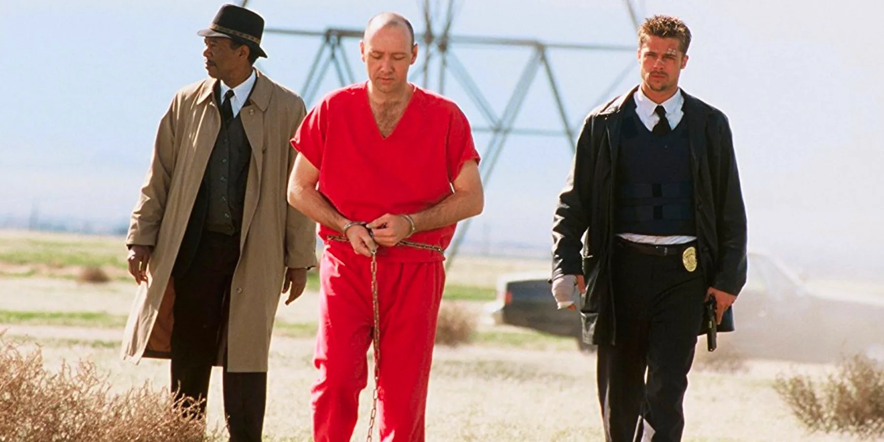 Brad Pitt as Mills, Kevin Spacey as John Doe, and Morgan Freeman as Somerset in the final scene as Se7en Image