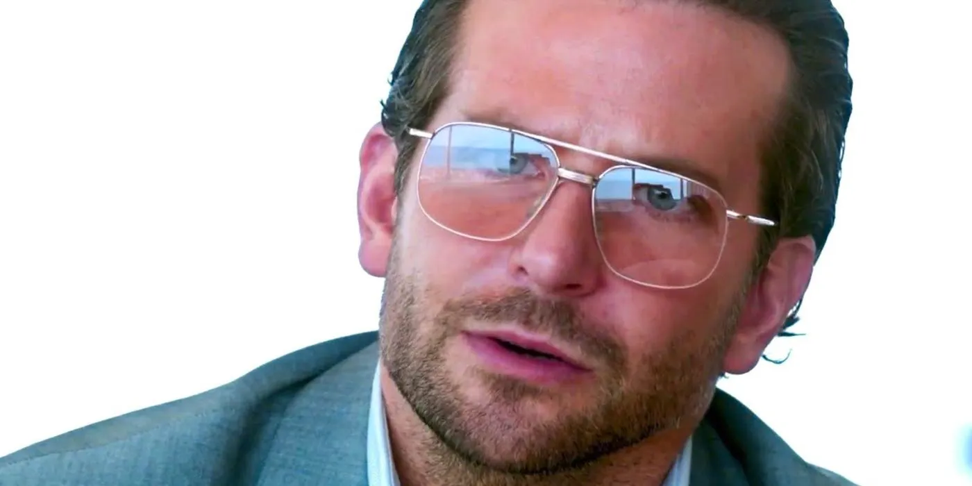 Bradley Cooper as Henry Girard wearing glasses in War Dogs Image