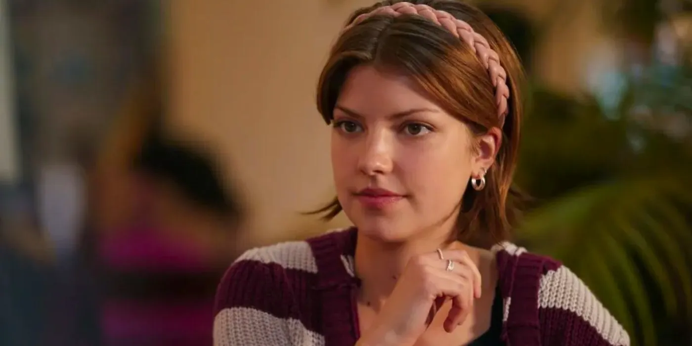 Bree (Catherine Missal) smiling at someone in Tell Me Lies. Image