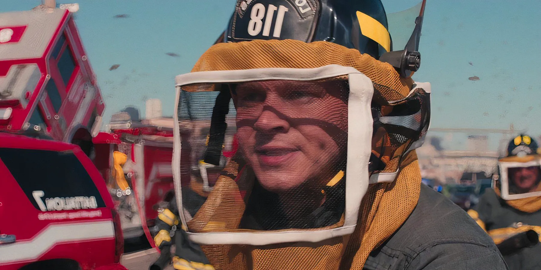 Buck in a beekeeper uniform in 9-1-1 season 8 episode 1 Image