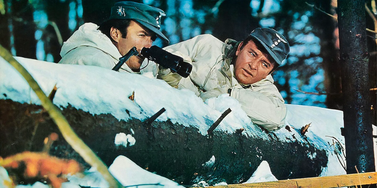 Burton and Eastwood as soldiers in the snow in Where Eagles Dare Image