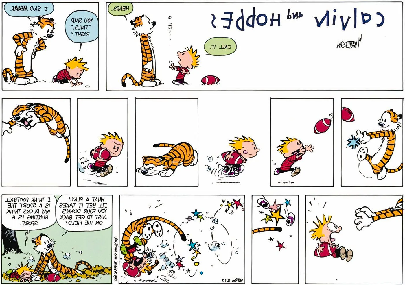 Calvin and Hobbes playing one-on-one football. Image