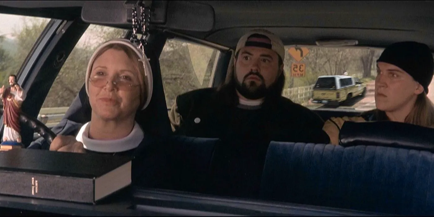 Carrie Fisher drives while Kevin Smith and Jason Mewes are in the passenger seats in Jay And Silent Bob Strike Back Image