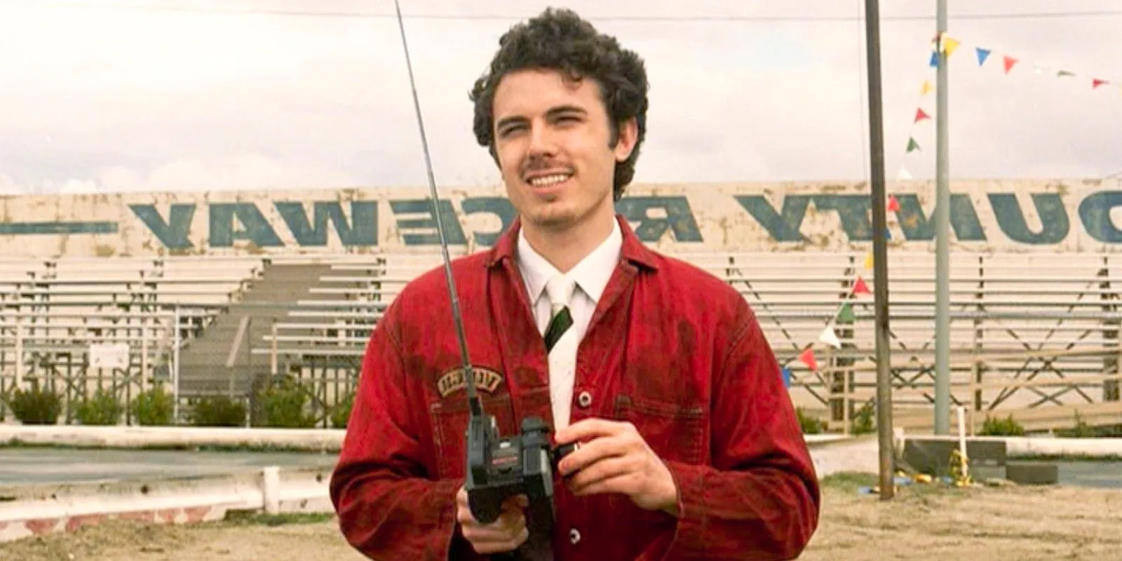 Casey Affleck at a race track in Ocean's Eleven Image