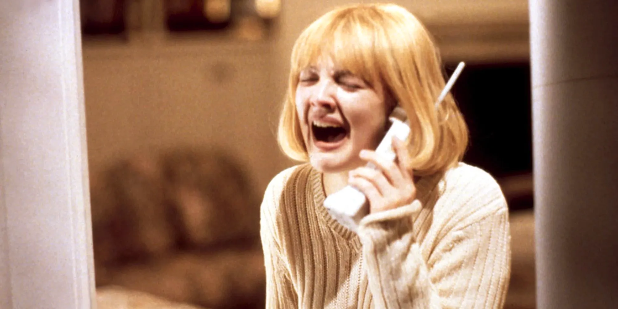 Casey screaming into the phone in the opening scene of Scream Image