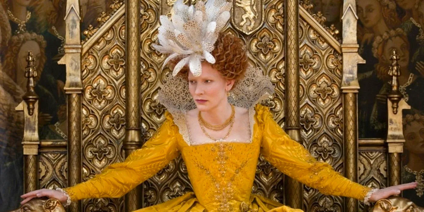 Cate Blanchett as Queen Elizabeth I sitting on a gold throne in a yellow gown in Elizabeth: The Golden Age. Image