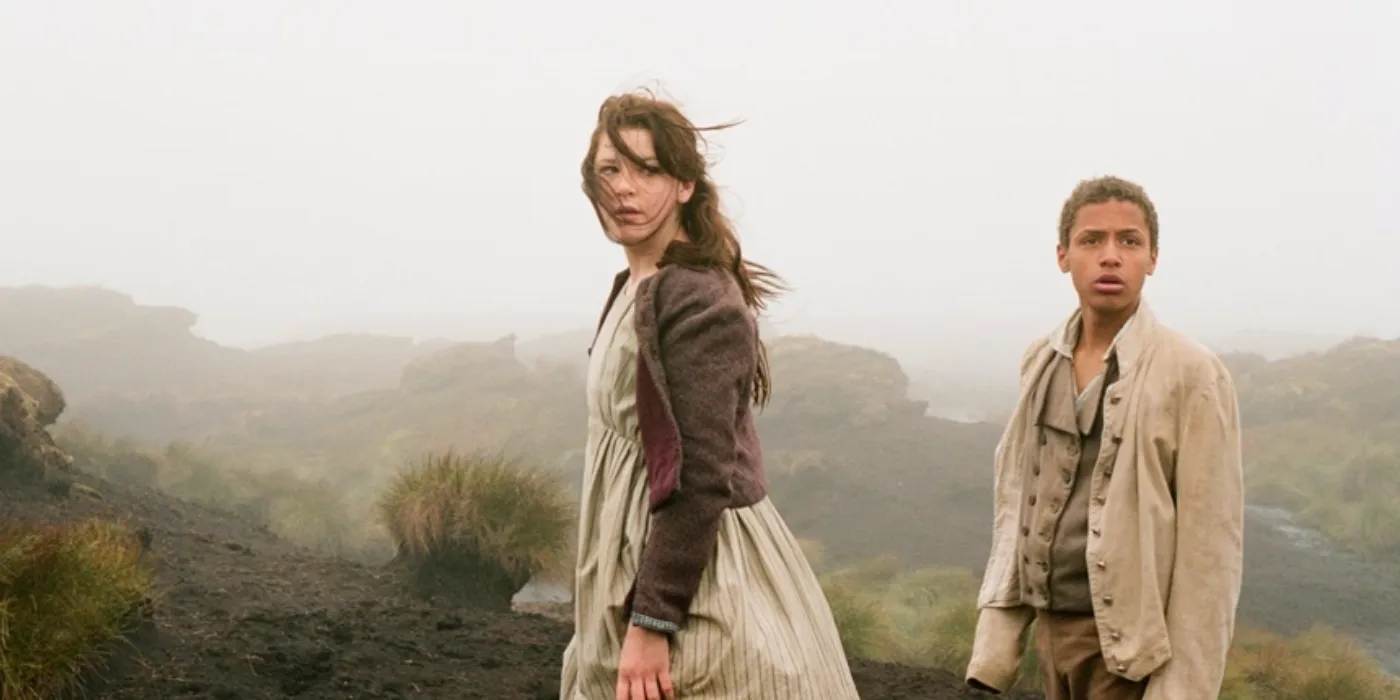 Catherine and Heathcliffe on a hillside in Wuthering Heights 2011  Image