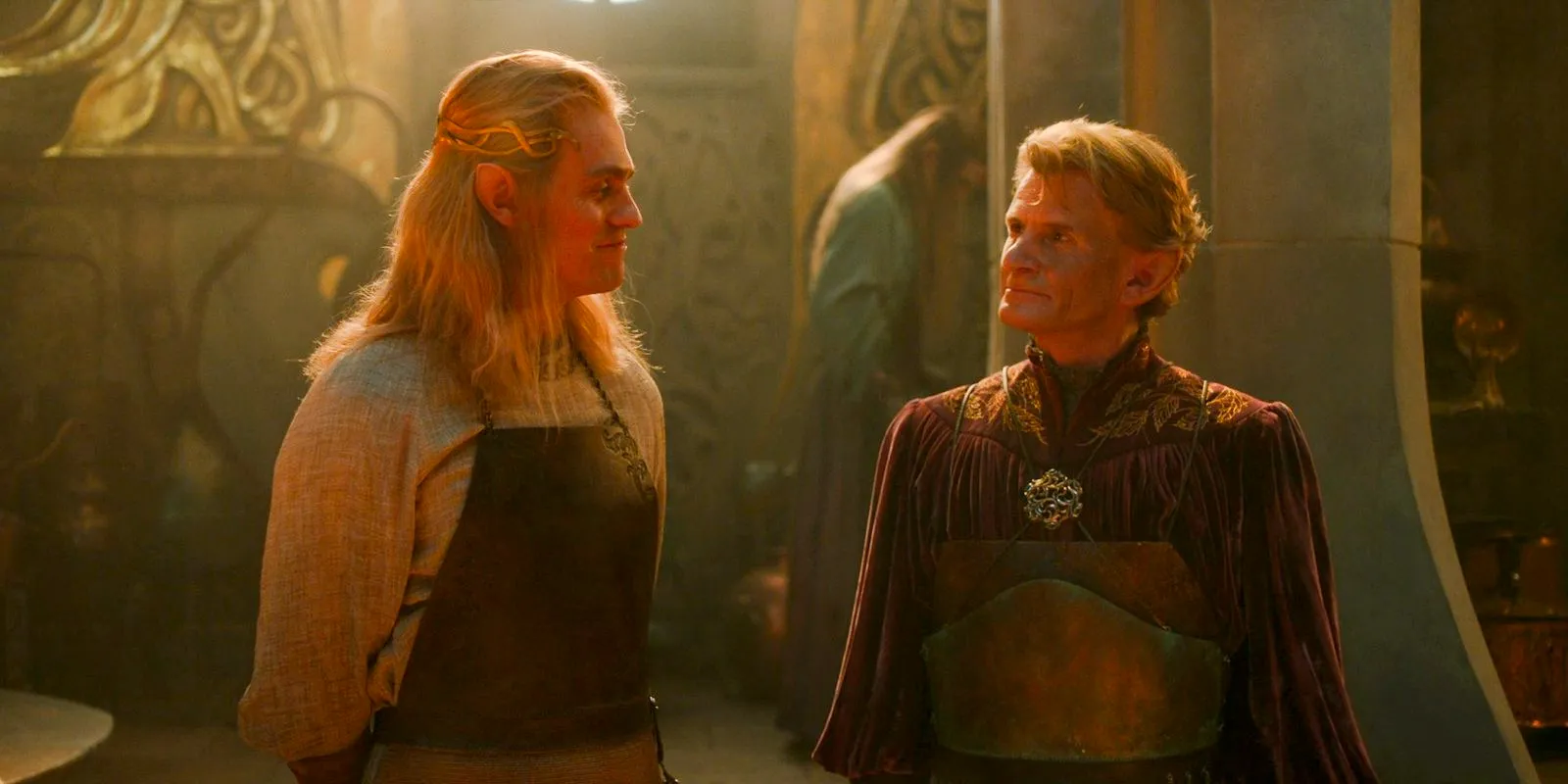 Celebrimbor and Annatar smile as they receive mithril from Durin and Disa in The Lord of the Rings: The Rings of Power. Image