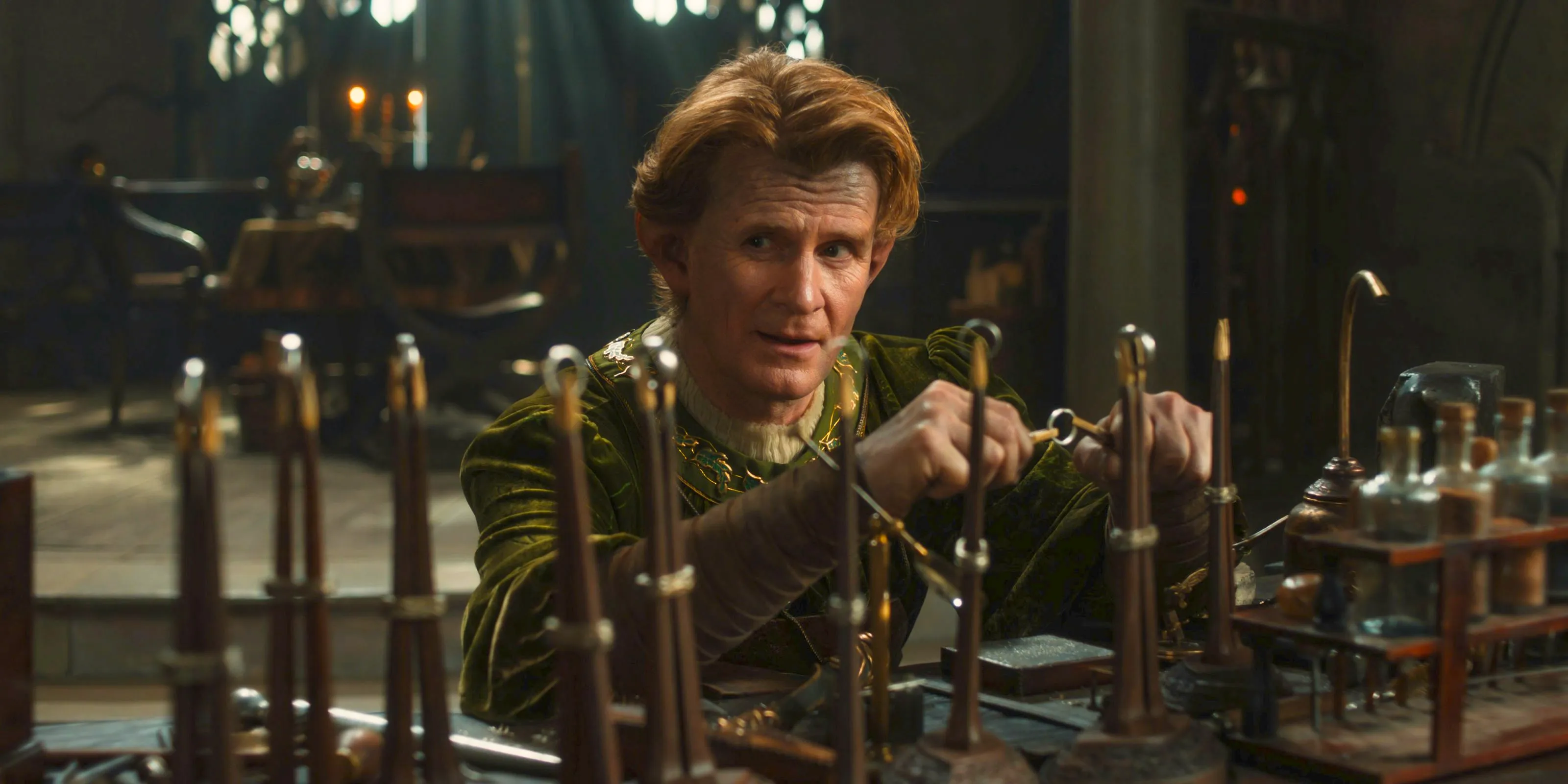 Celebrimbor (Charles Edwards) forging the nine rings for mortal men in The Lord of the Rings: The Rings of Power Season 2 Episode 7 Image