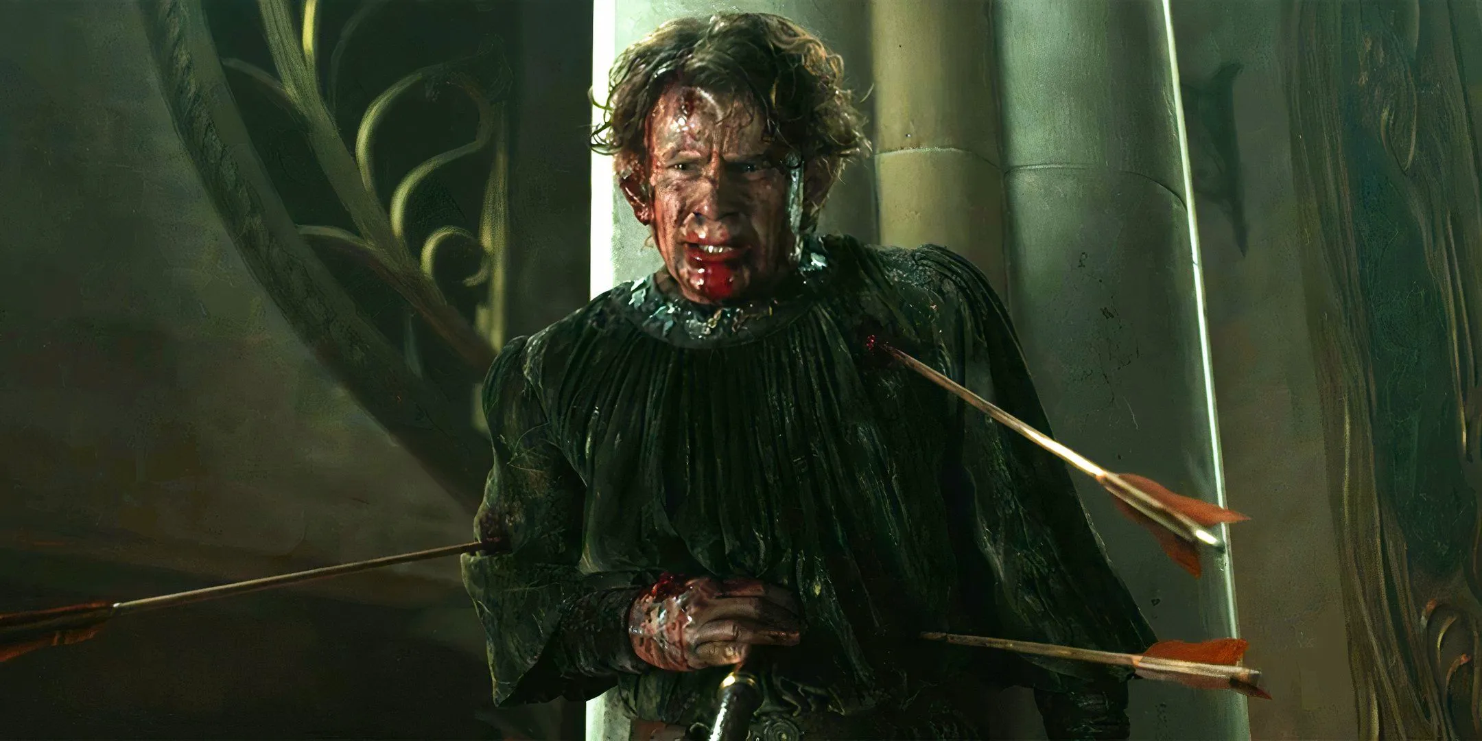 Charles Edwards as Celebrimbor looking sad while impaled on a spear and arrows sticking out of him in The Rings of Power season 2 finale Image