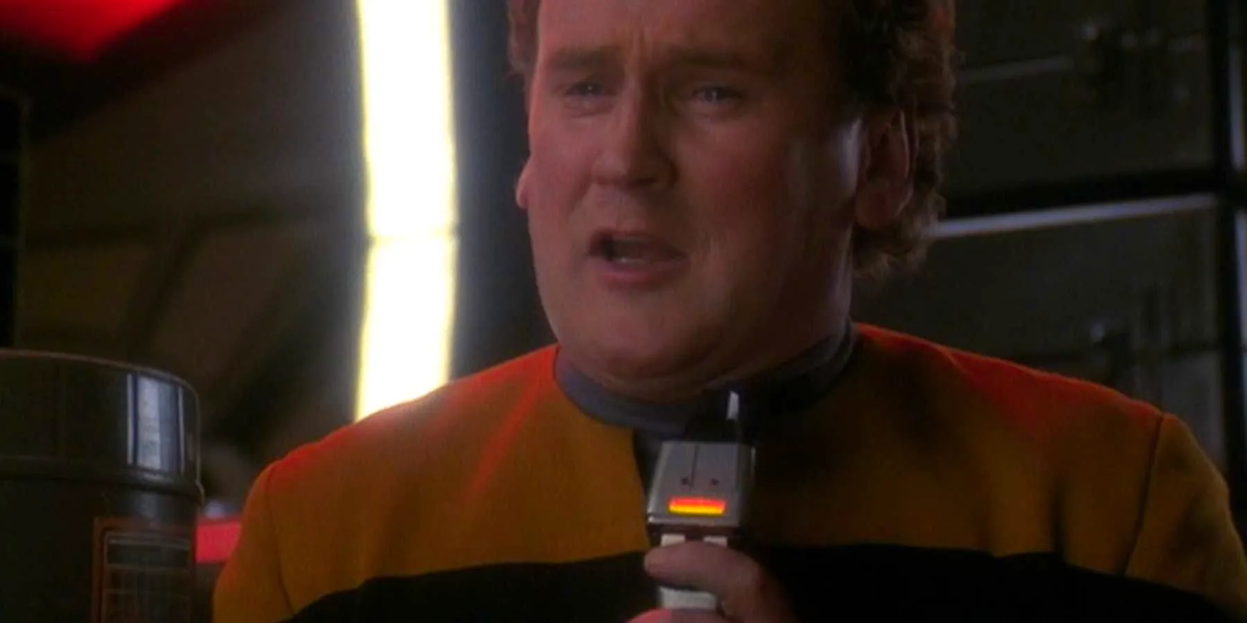 Chief Miles O'Brien (Colm Meaney) turns a phaser on himself in obvious distress in the Star Trek: DS9 episode 