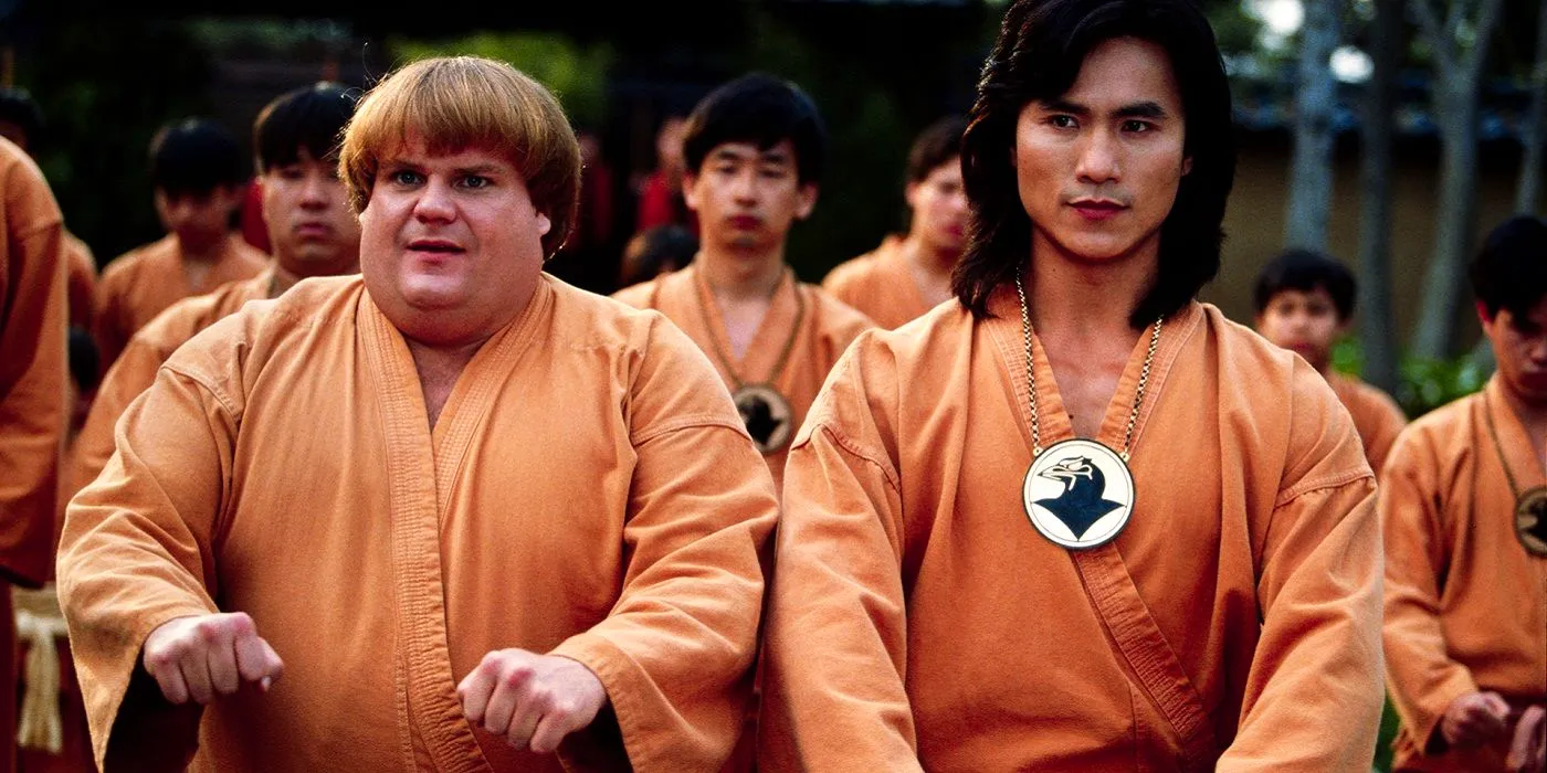 Chris Farley and Robin Shou in orange uniforms, training, in Beverly Hills Ninja Image