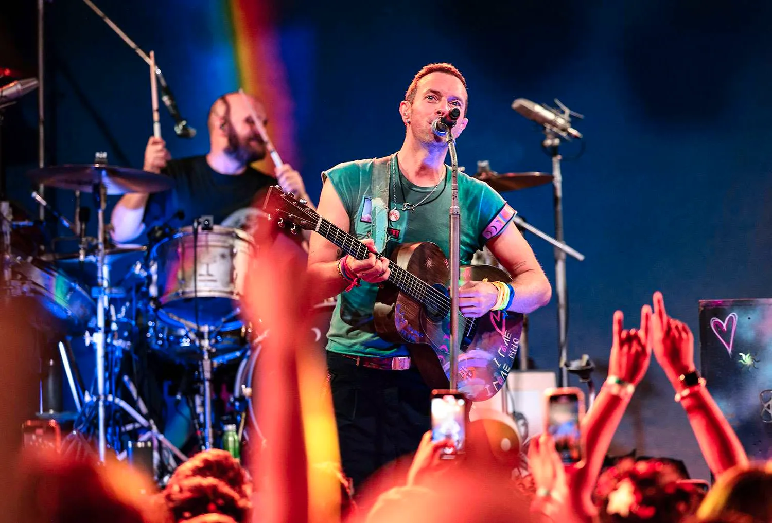 Chris Martin Falls in Stage Trap Door While Performing with Coldplay in Australia Image