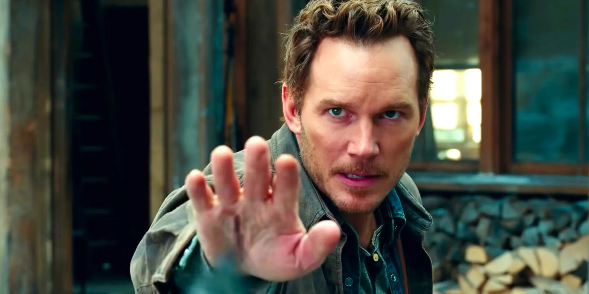 Chris Pratt raising his hand in Jurassic World Dominion Image