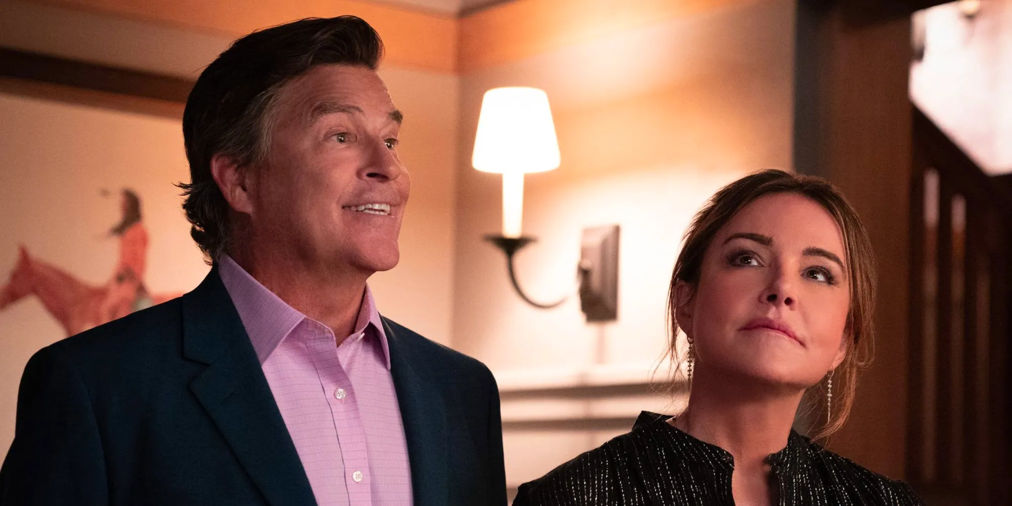 Christa Miller As Liz & Ted McGinley As Derek, smiling as always, in Shrinking Image