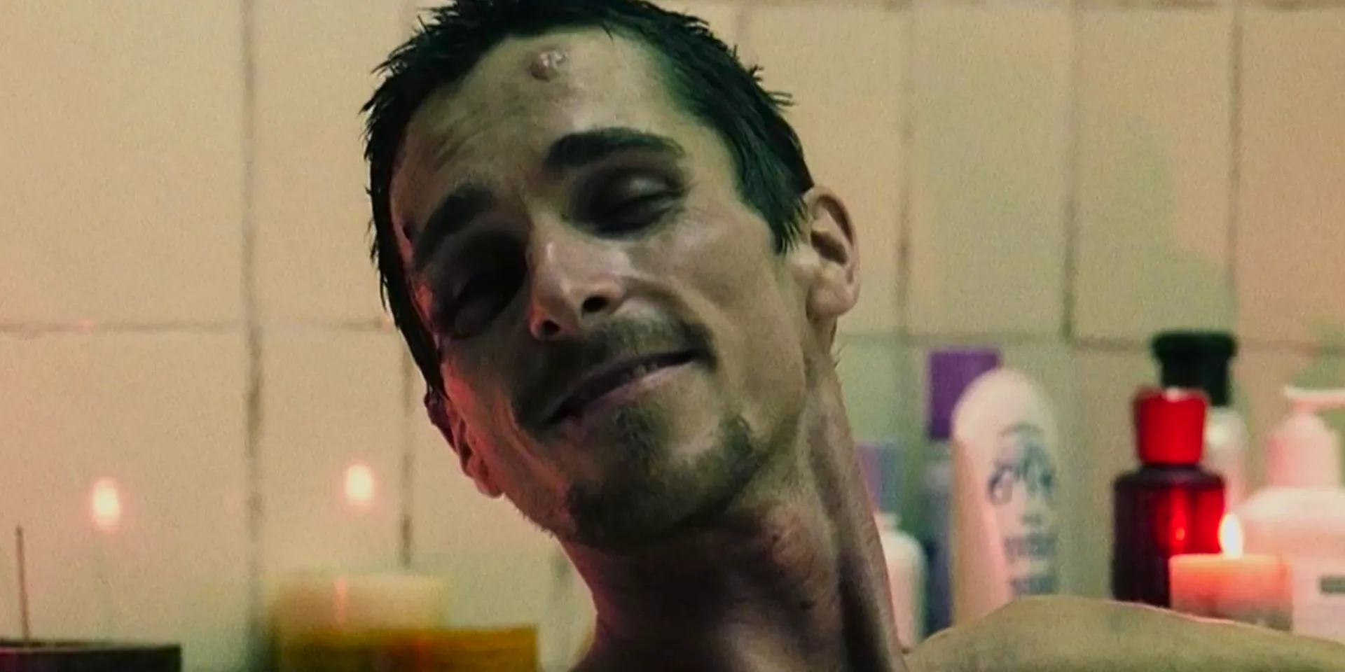 Christian Bale smiling in The Machinist Image