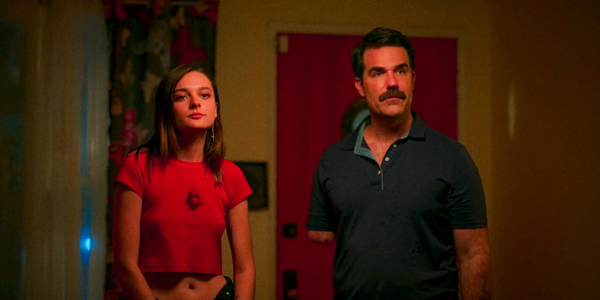 Christopher (Rob Delaney) and Caitlin (Charlotte Lawrence) listening to Eve's complaints in Bad Monkey Season 1 Episode 5 Image