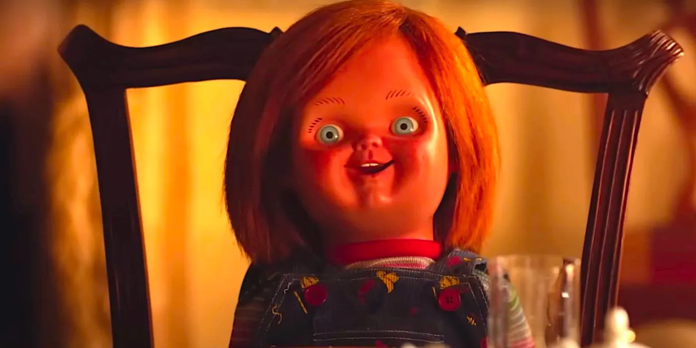 Chucky sitting in a chair looking harmless in Chucky season 3 Image