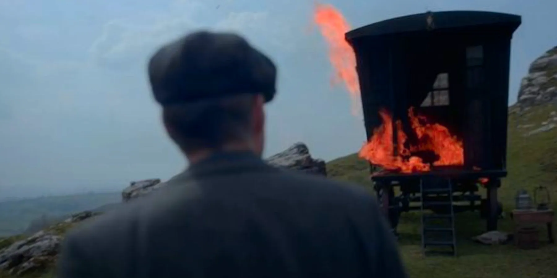 Cillian Murphy as Tommy Shelby watching his wagon burn in the Peaky Blinders season 6 finale. Image