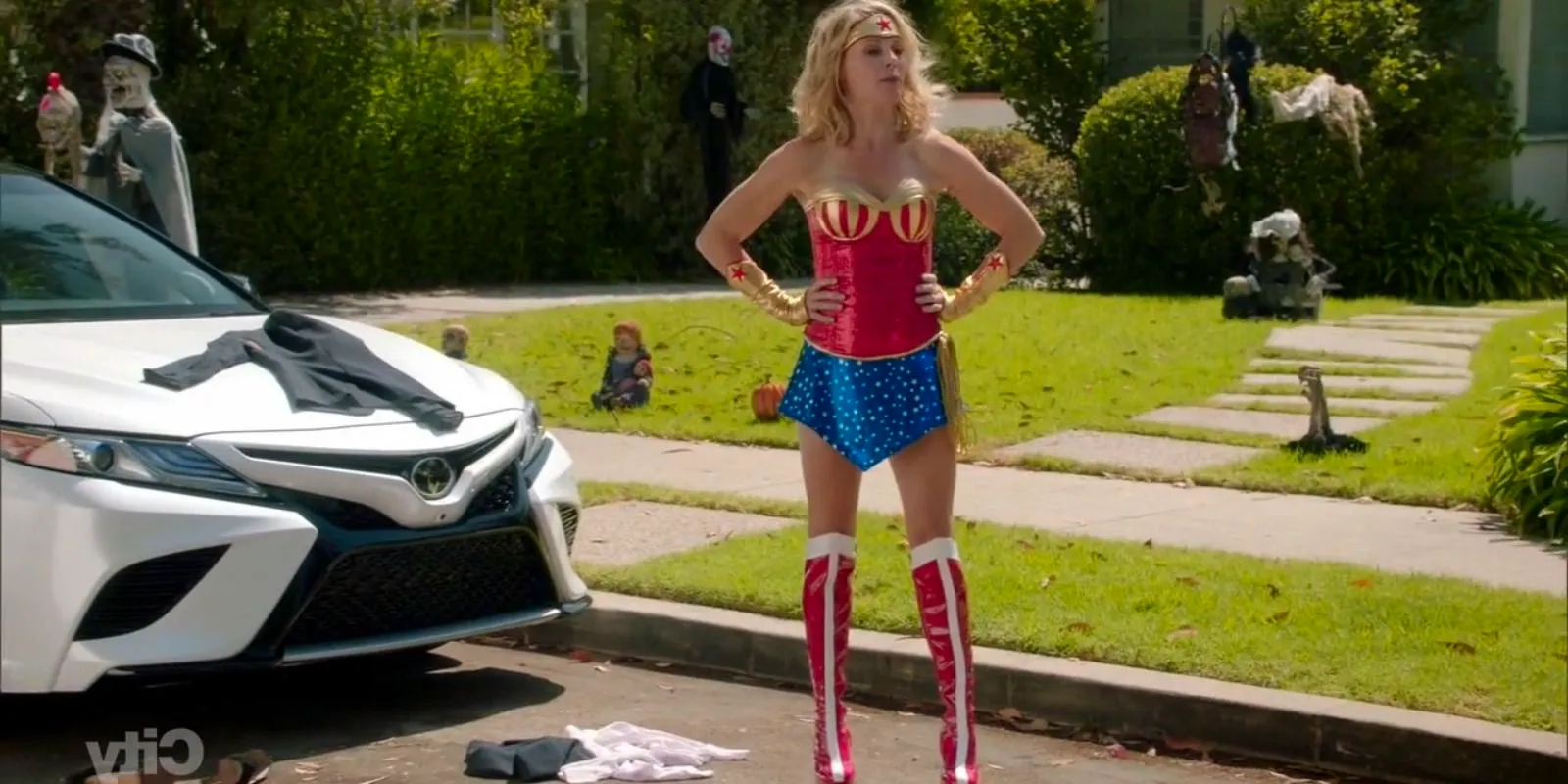 Claire in a costume on Halloween on Modern Family Image