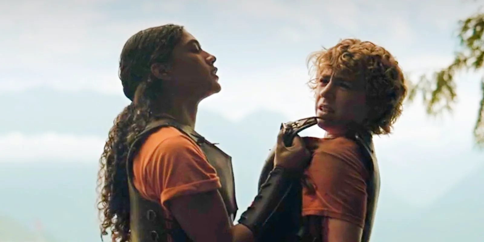 Clarisse holding Percy by his armor in Percy Jackson and the Olympians. Image