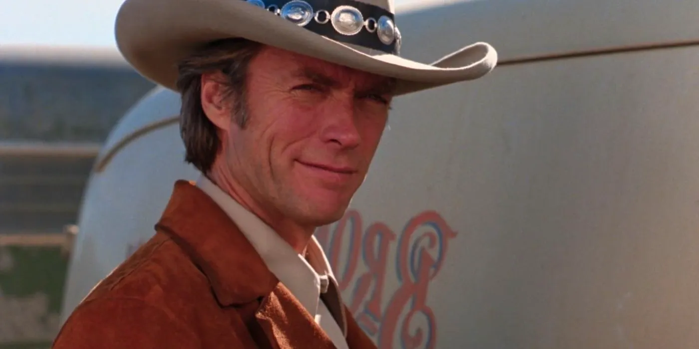 Clint Eastwood smirking in Bronco Billy Image