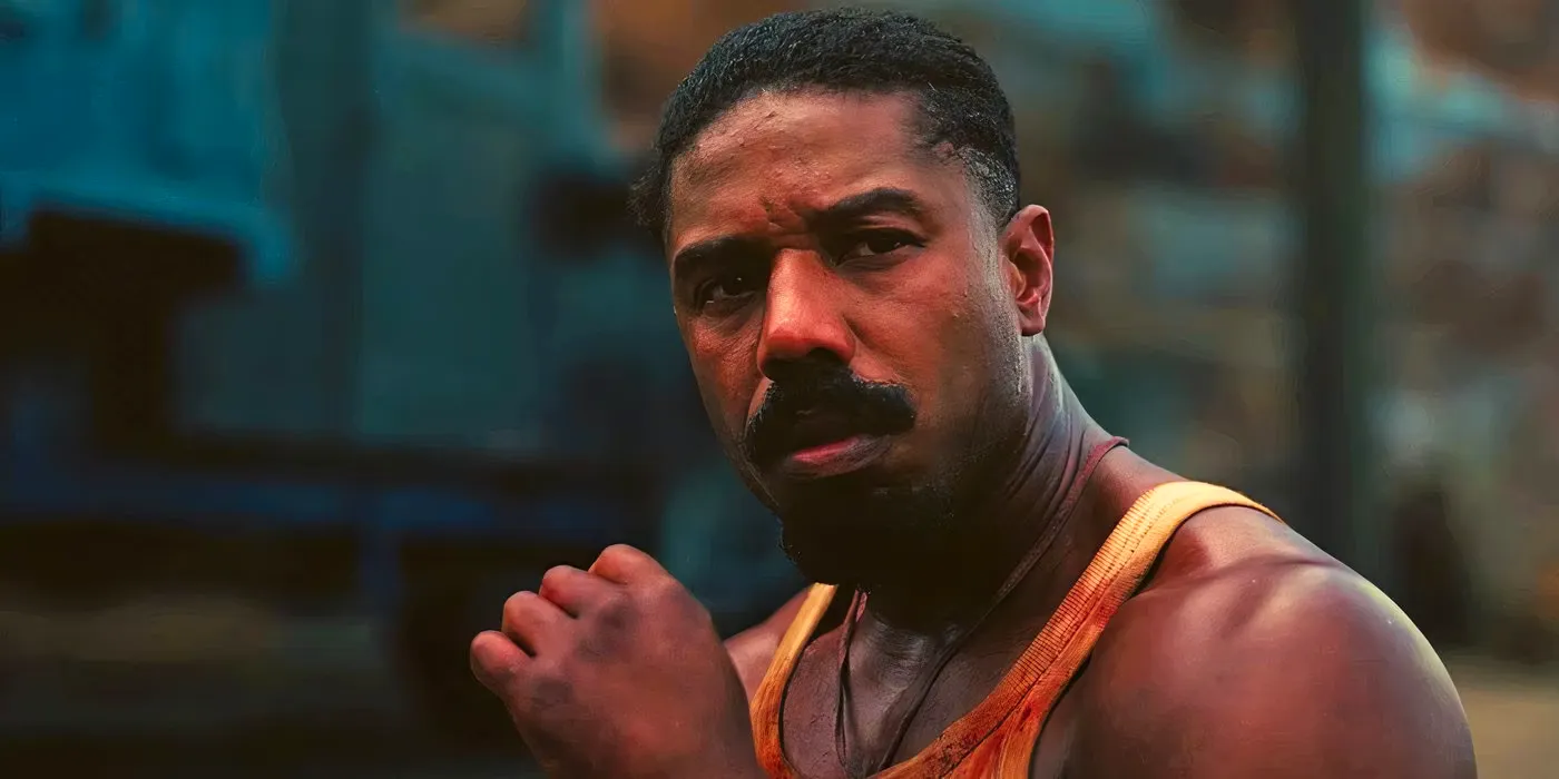 Close up of Michael B Jordan looking pensive in Sinners Image