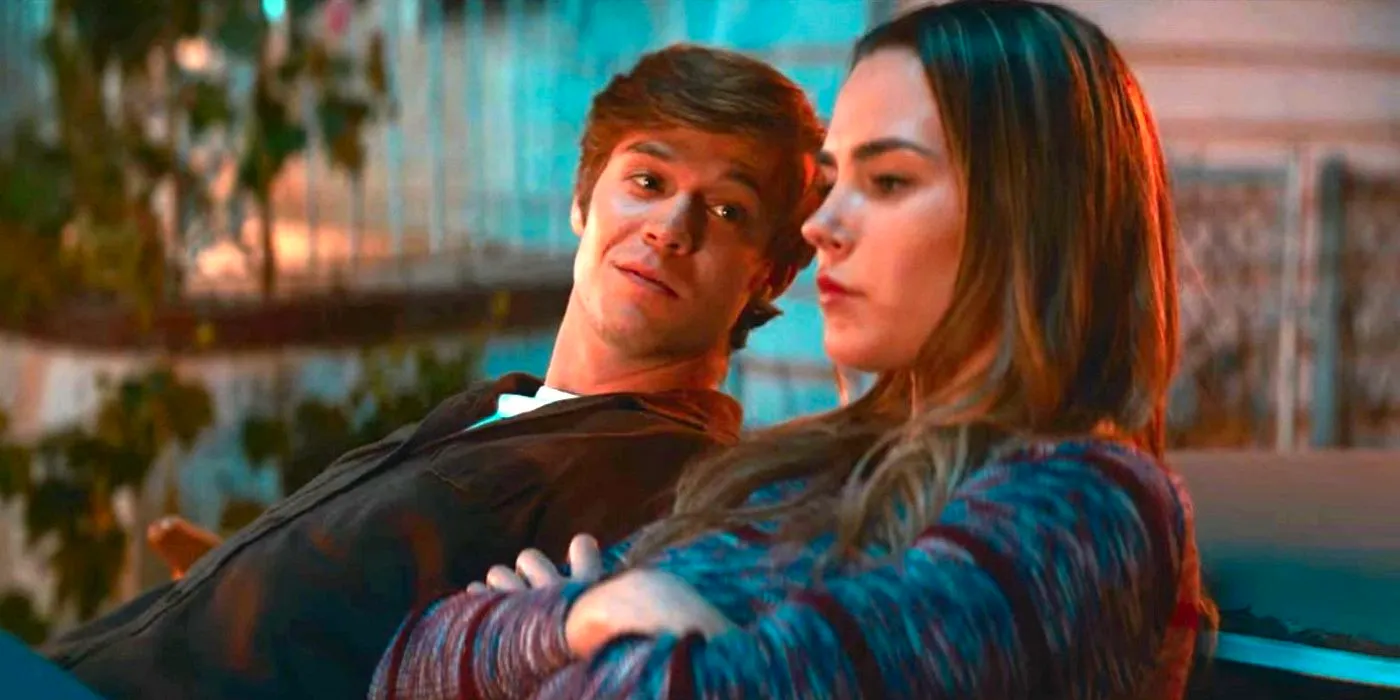 Colin Ford as Rickey Hill and Siena Bjornerud as Gracie Shanz sitting together in The Hill. Image