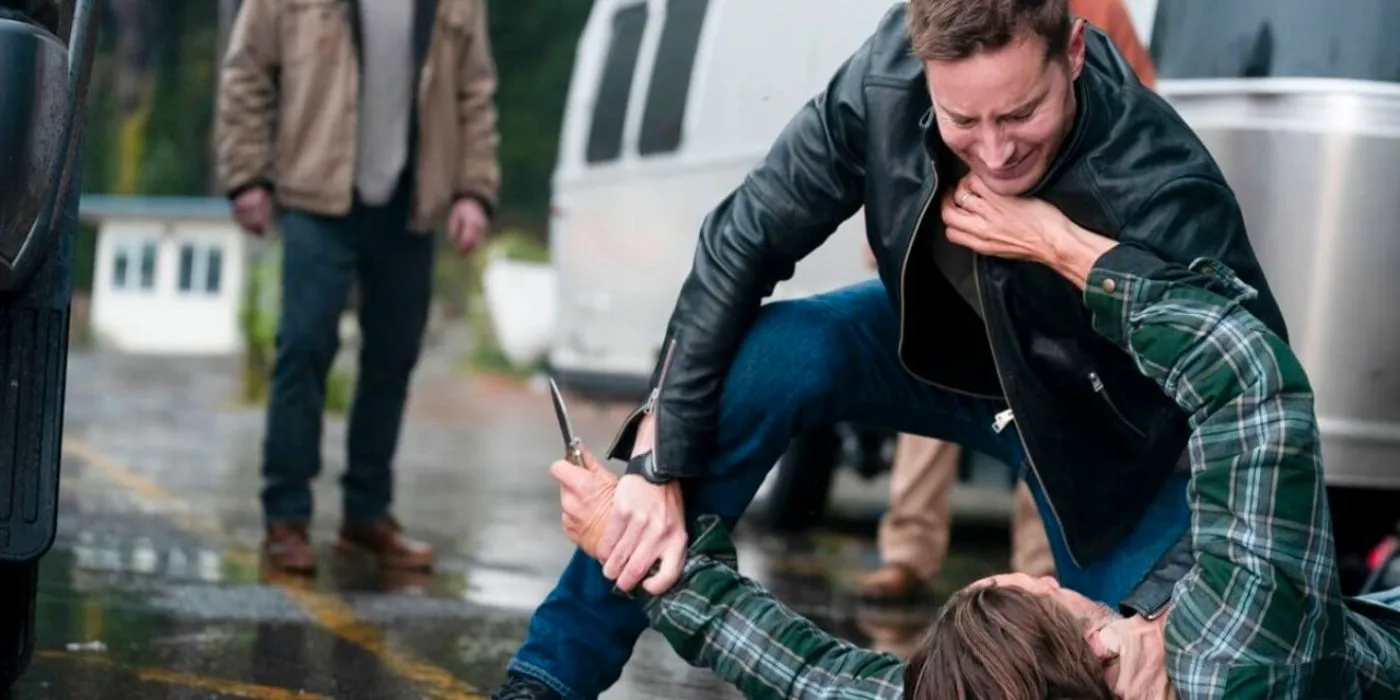 Colter (Justin Hartley) fighting with a man holding a knife in Tracker. Image