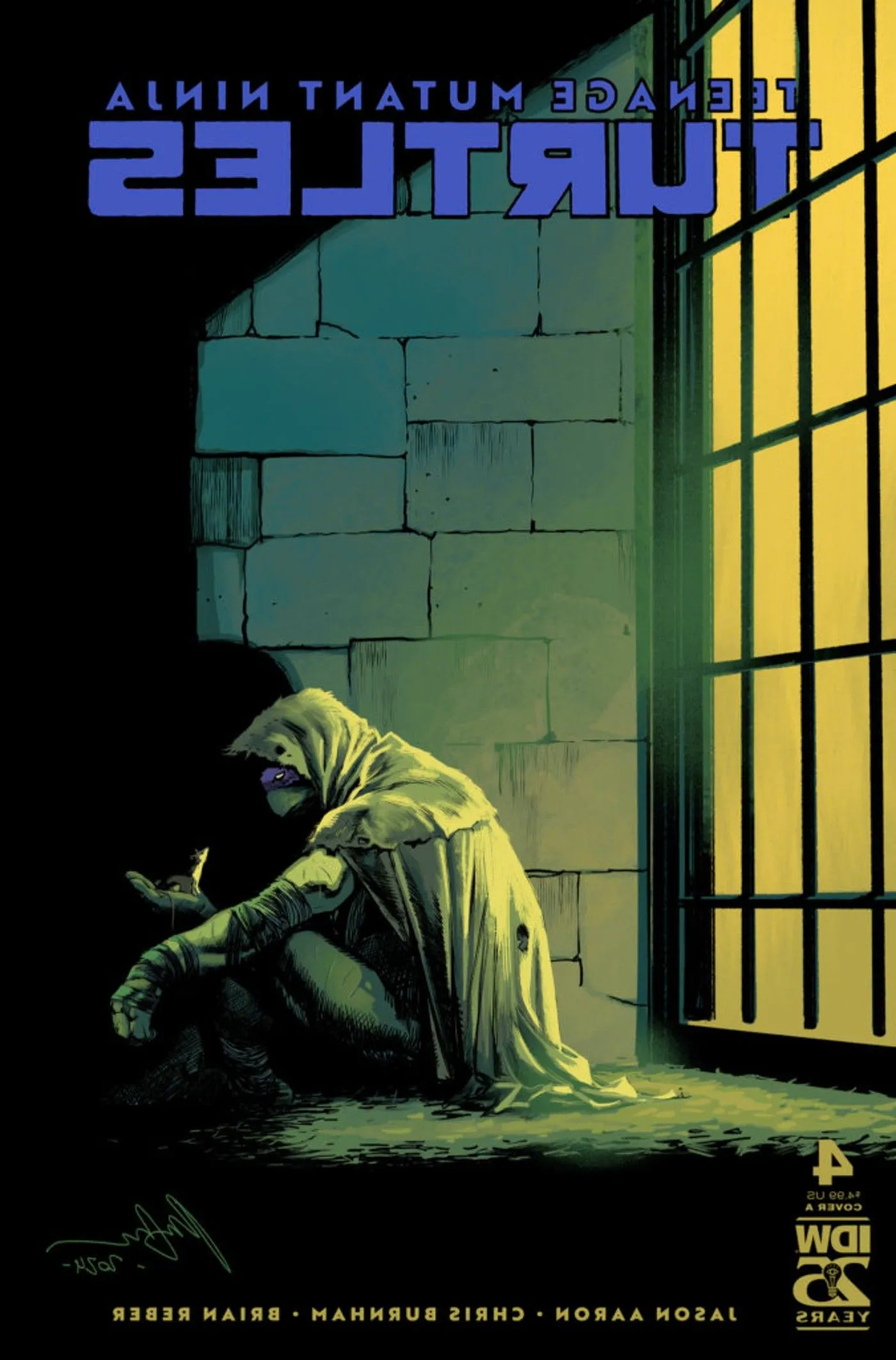 Comic book cover: Donatello sits in a cell wearing a cloak, holding a rat in his hand. Image