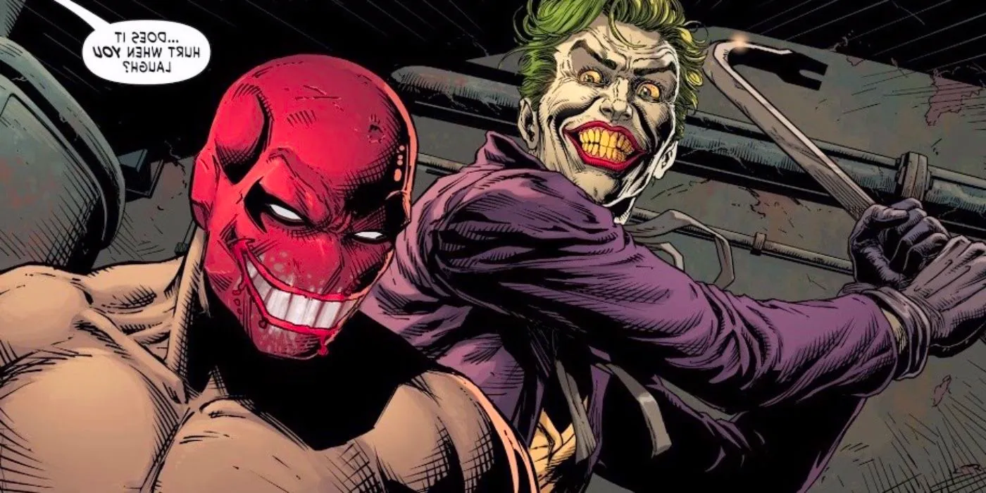 Comic book panel: Joker beats Red Hood, whose mask has a terrifying Joker grin painted on. Image