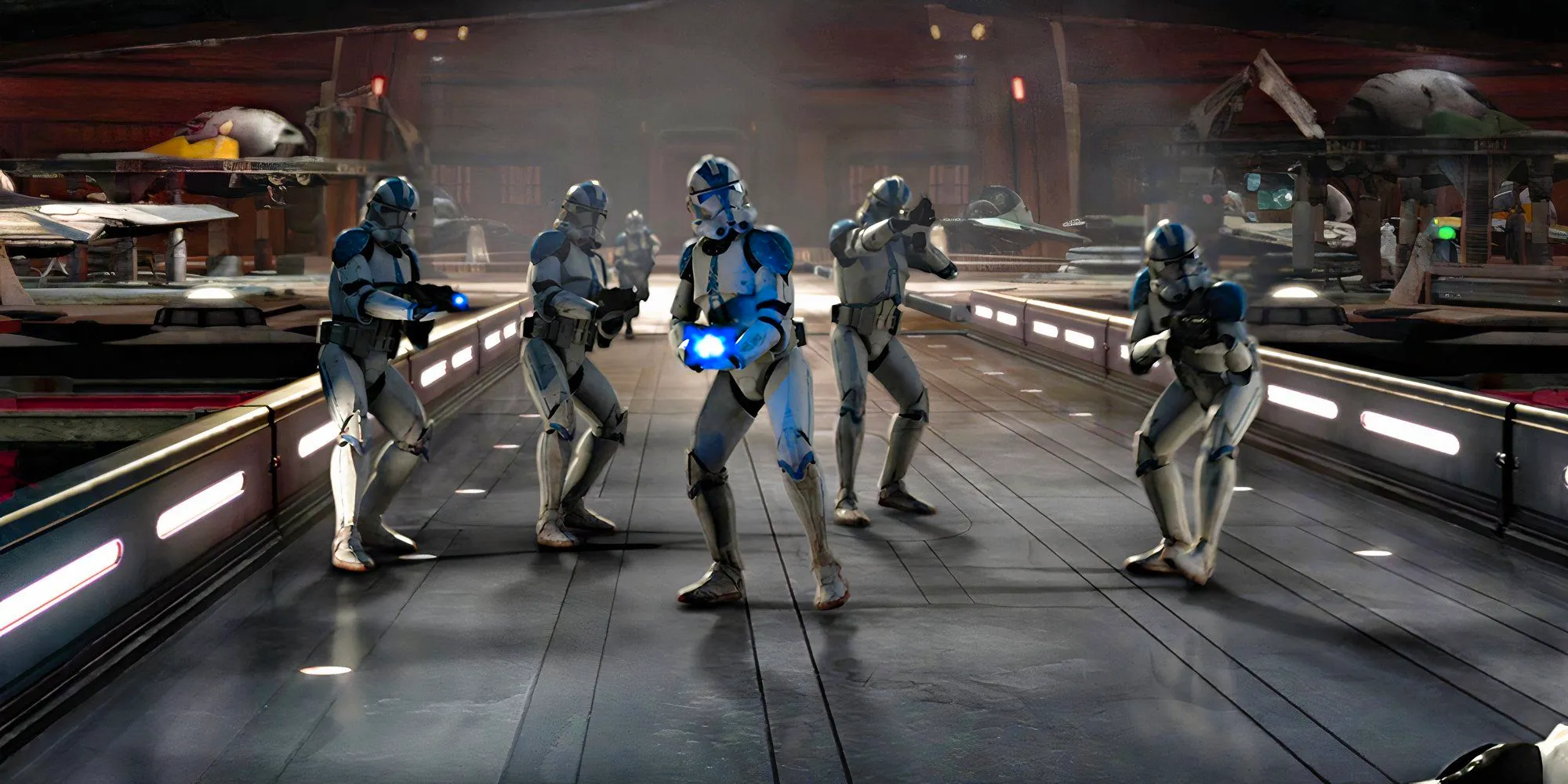 Commander Appo, Sergeant Fox, and the rest of their unit of clone troopers take aim at a Jedi Padawan at the Jedi Temple during Order 66. Image