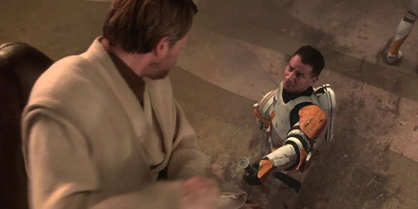 Commander Cody (Temuera Morrison) hands Obi-Wan Kenobi (Ewan McGregor) his lightsaber in Star Wars: Episode III - Revenge of the Sith Image