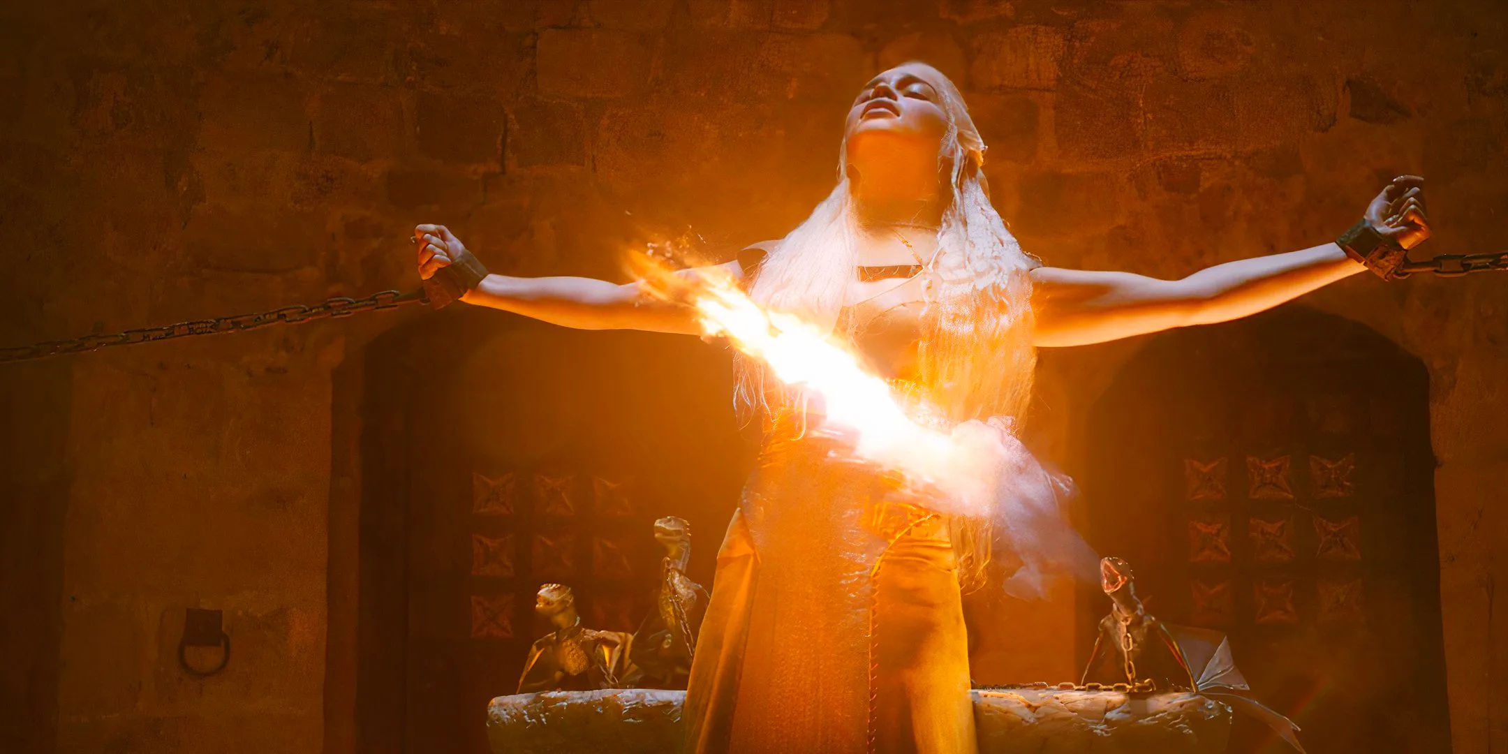 Daenerys with her baby dragons breathing fire at the House of the Undying in Game of Thrones Image