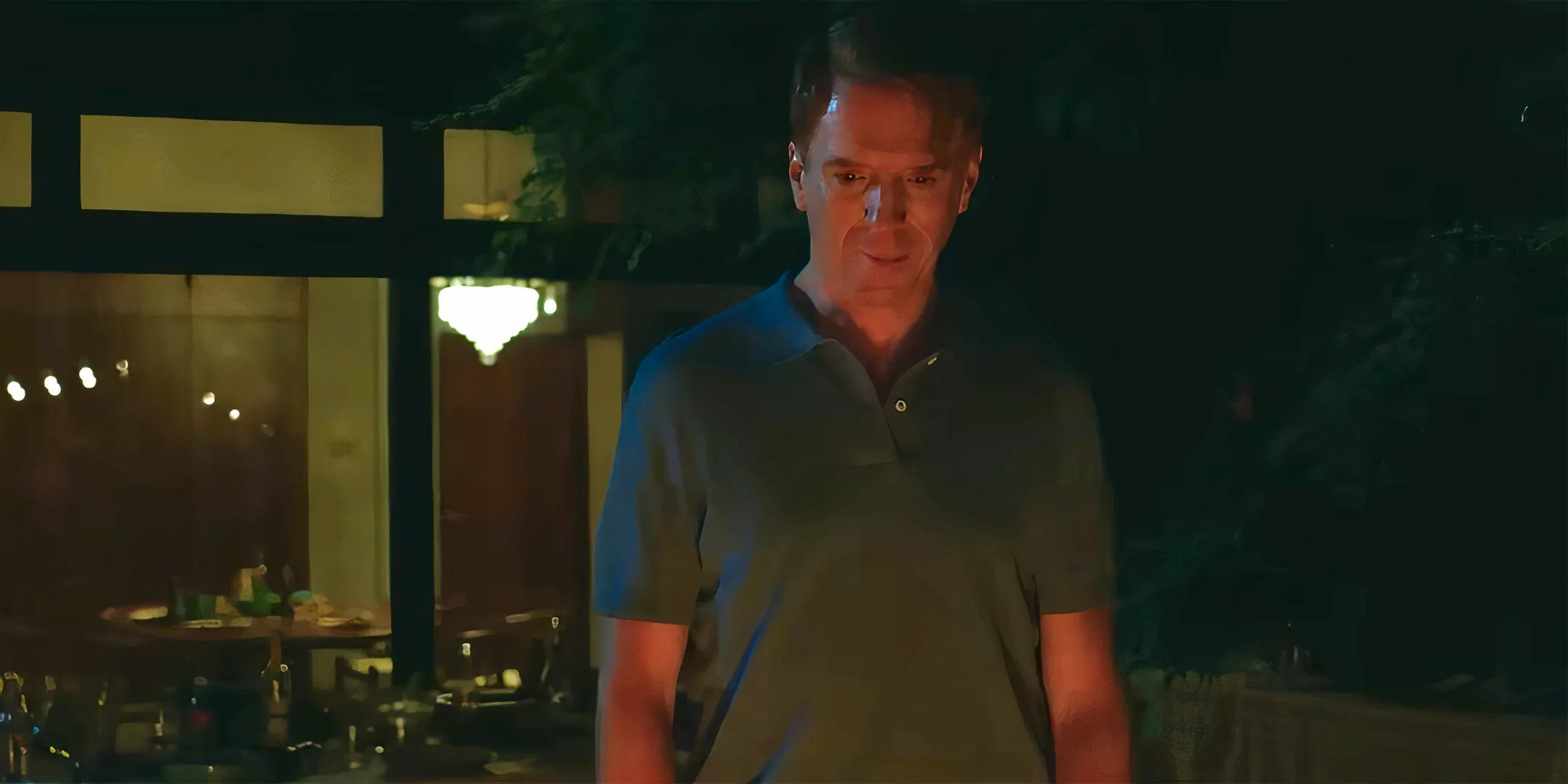 Damian Lewis as Peter looking at a bonfire in The Radleys Image