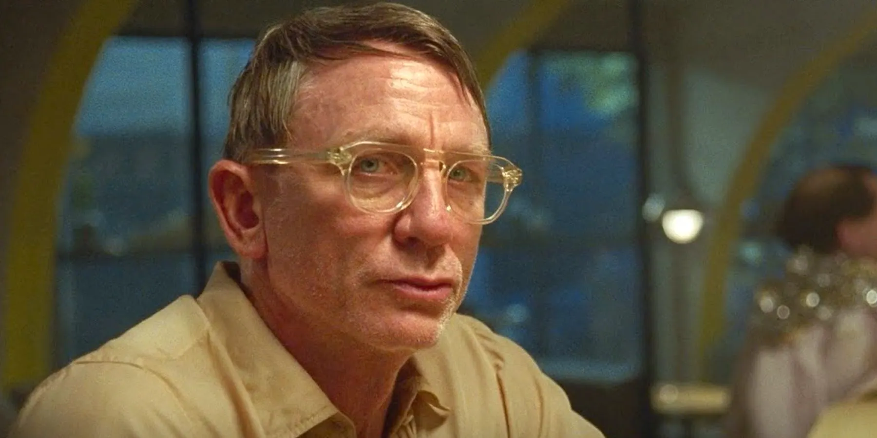 Daniel Craig wearing glasses in Queer Image