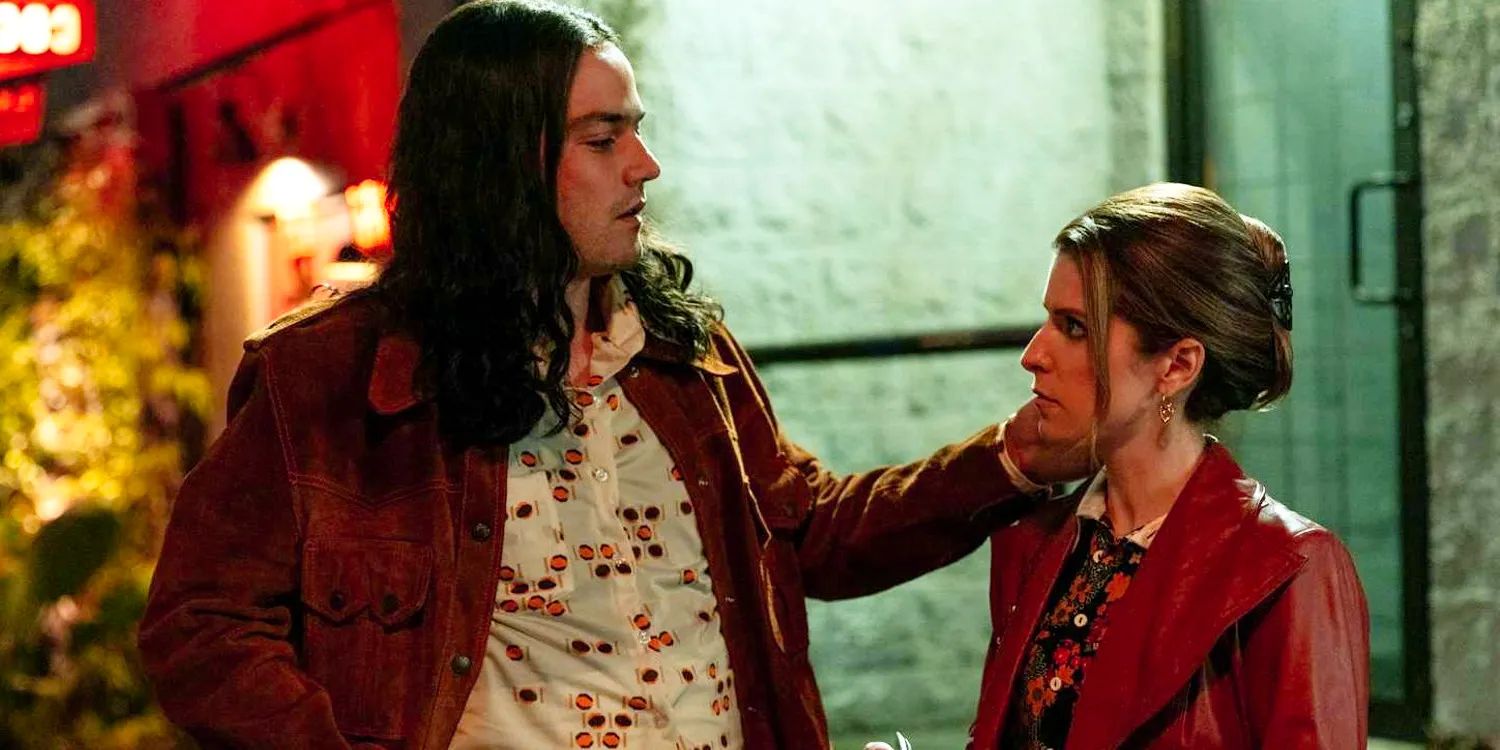 Daniel Zovatto touching Anna Kendrick's hair in Woman of the Hour Image