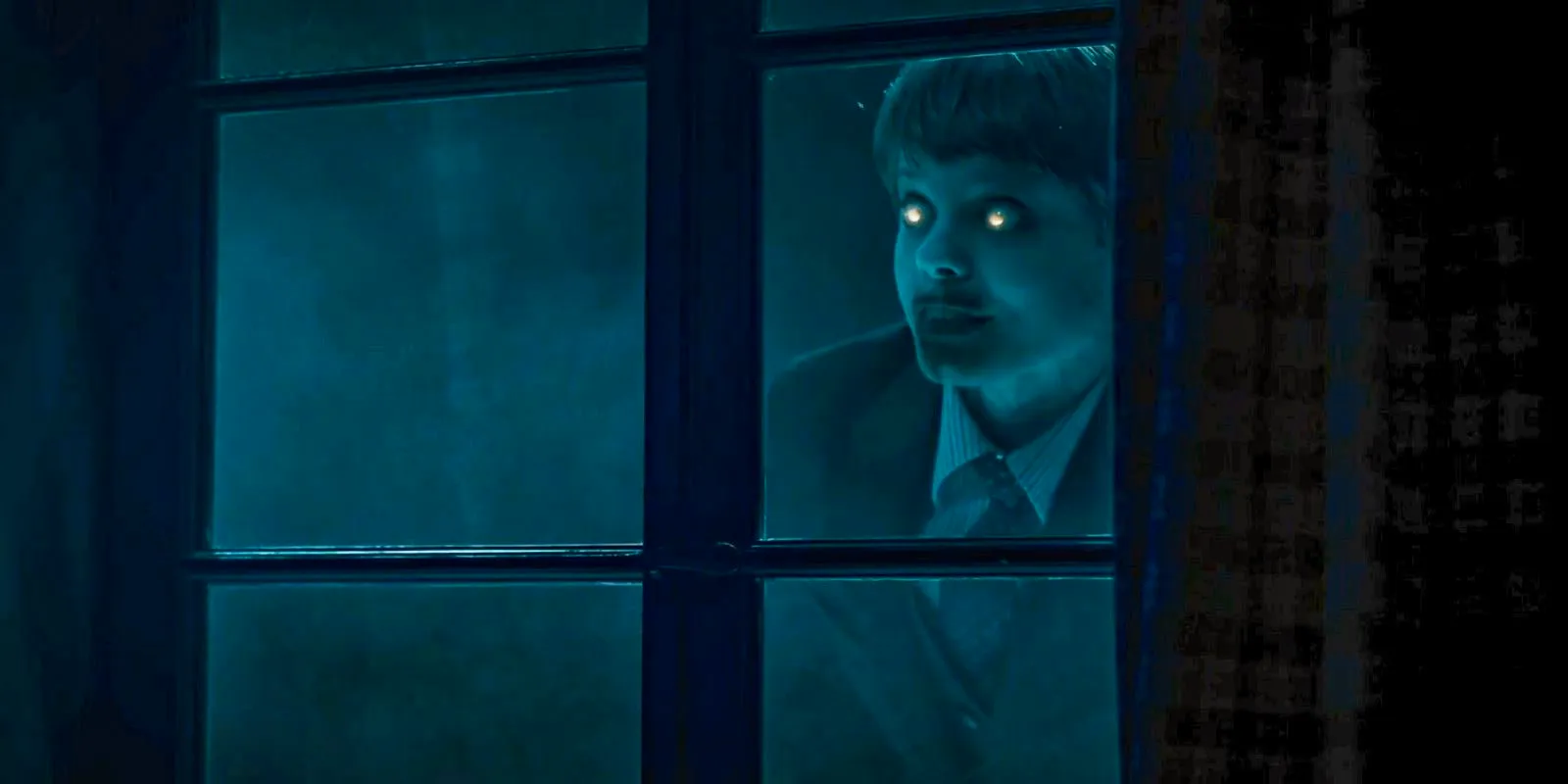 Danny turned into a vampire looking at Mark through the window in Salem's Lot (2024) Image