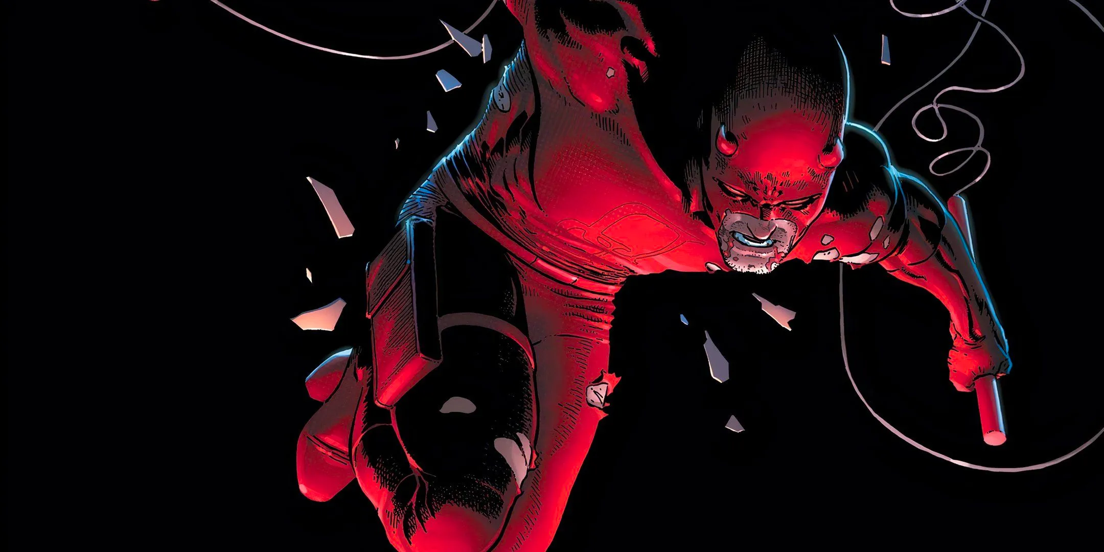 Daredevil falling through darkness, baton in hand, look of rage on his face. Image