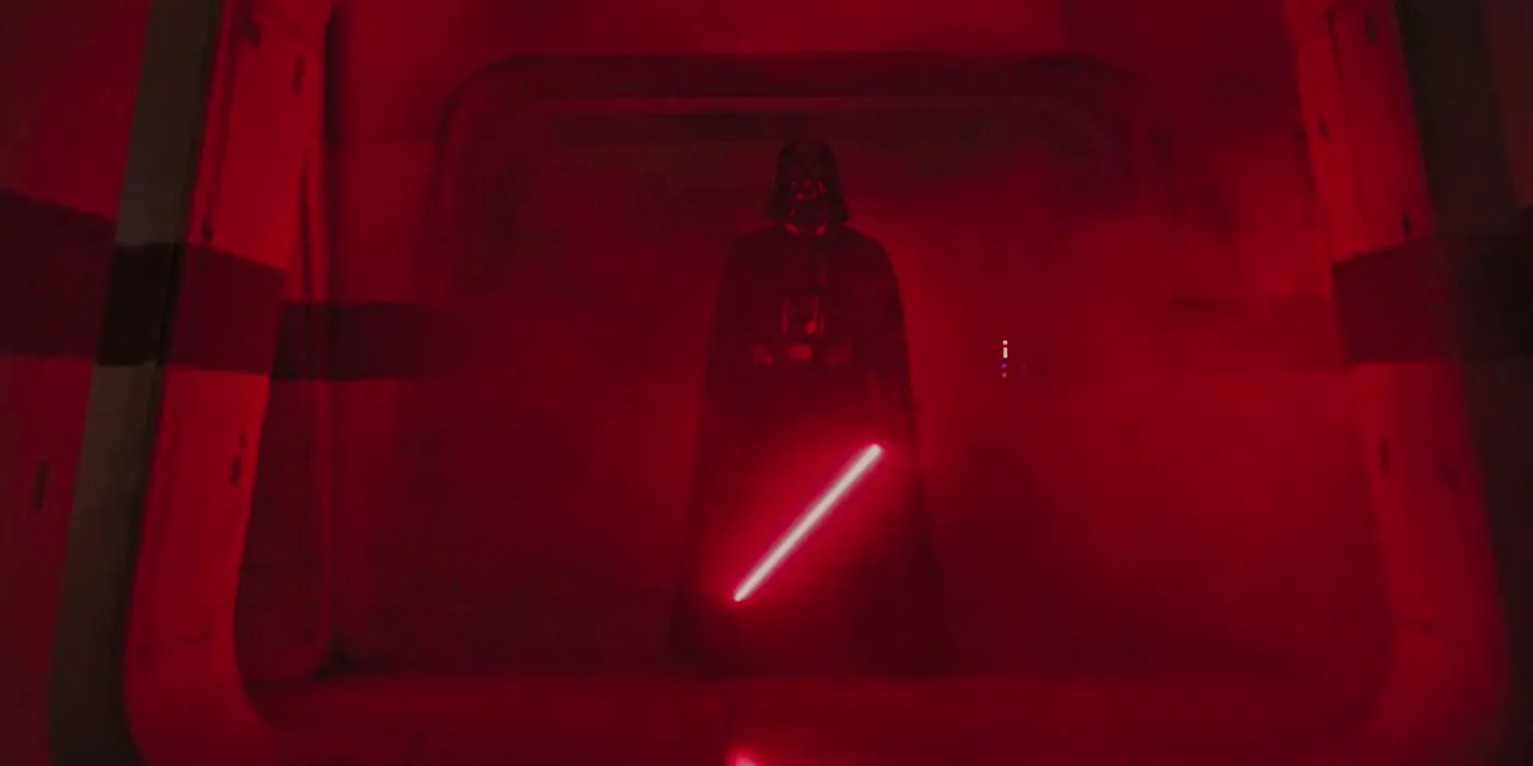 Darth Vader holding his lightsaber in Rogue One: A Star Wars Story. Image