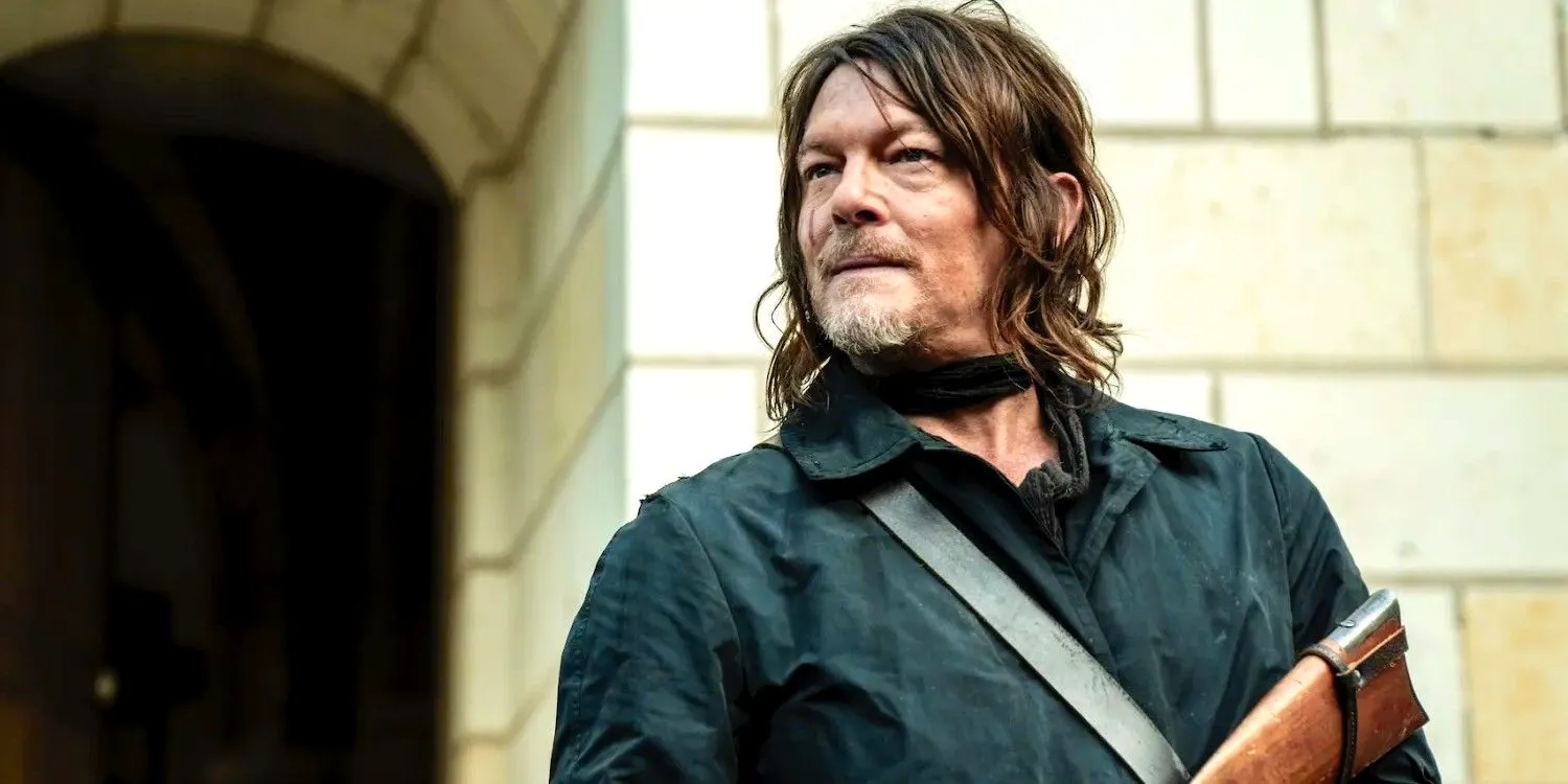 Daryl holding a gun in The Walking Dead Daryl Dixon Image