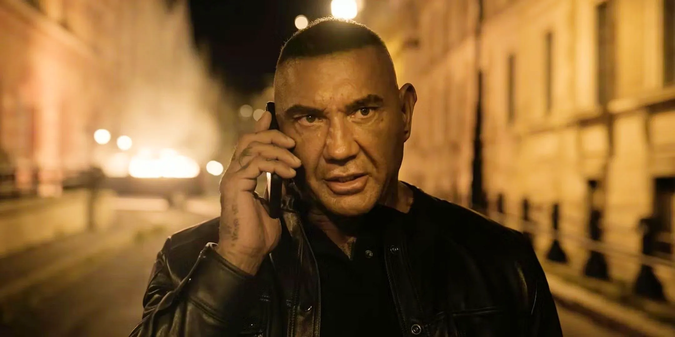 Dave Bautista on the Phone in The Killer's Game Image