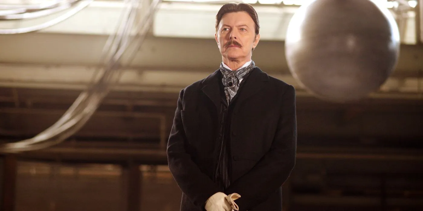  David Bowie's as Tesla looking at something in The Prestige. Image