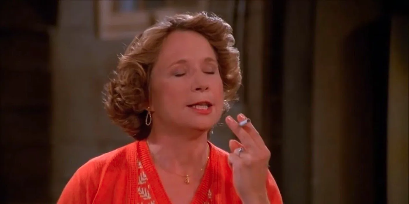 Debra Jo Rupp as Kitty Forman Smoking in That '70s Show Season 1 Episode 10 Image