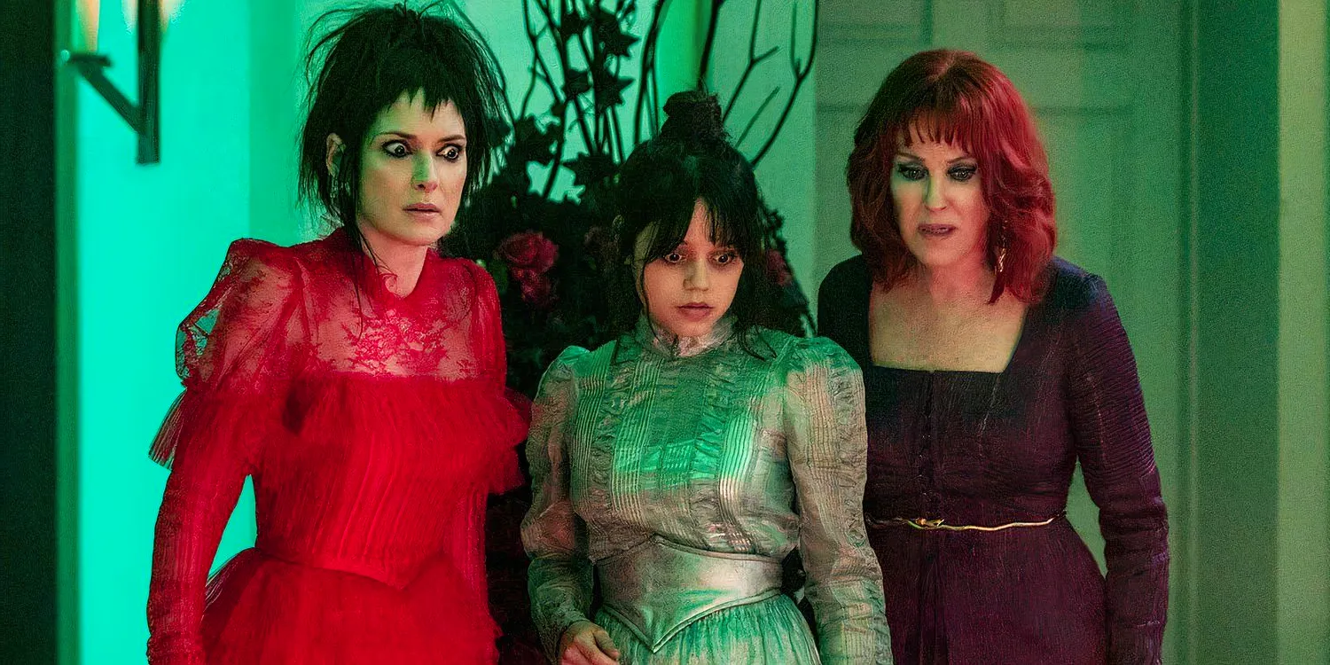 Delia, Astrid, and Lydia looking at the ground in Beetlejuice 2 Image