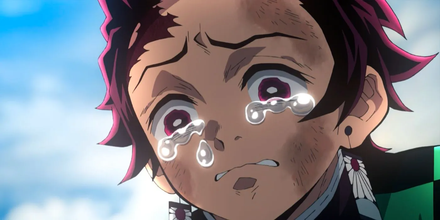 Demon Slayer's Tanjiro, crying in the Mugen Train film. Image